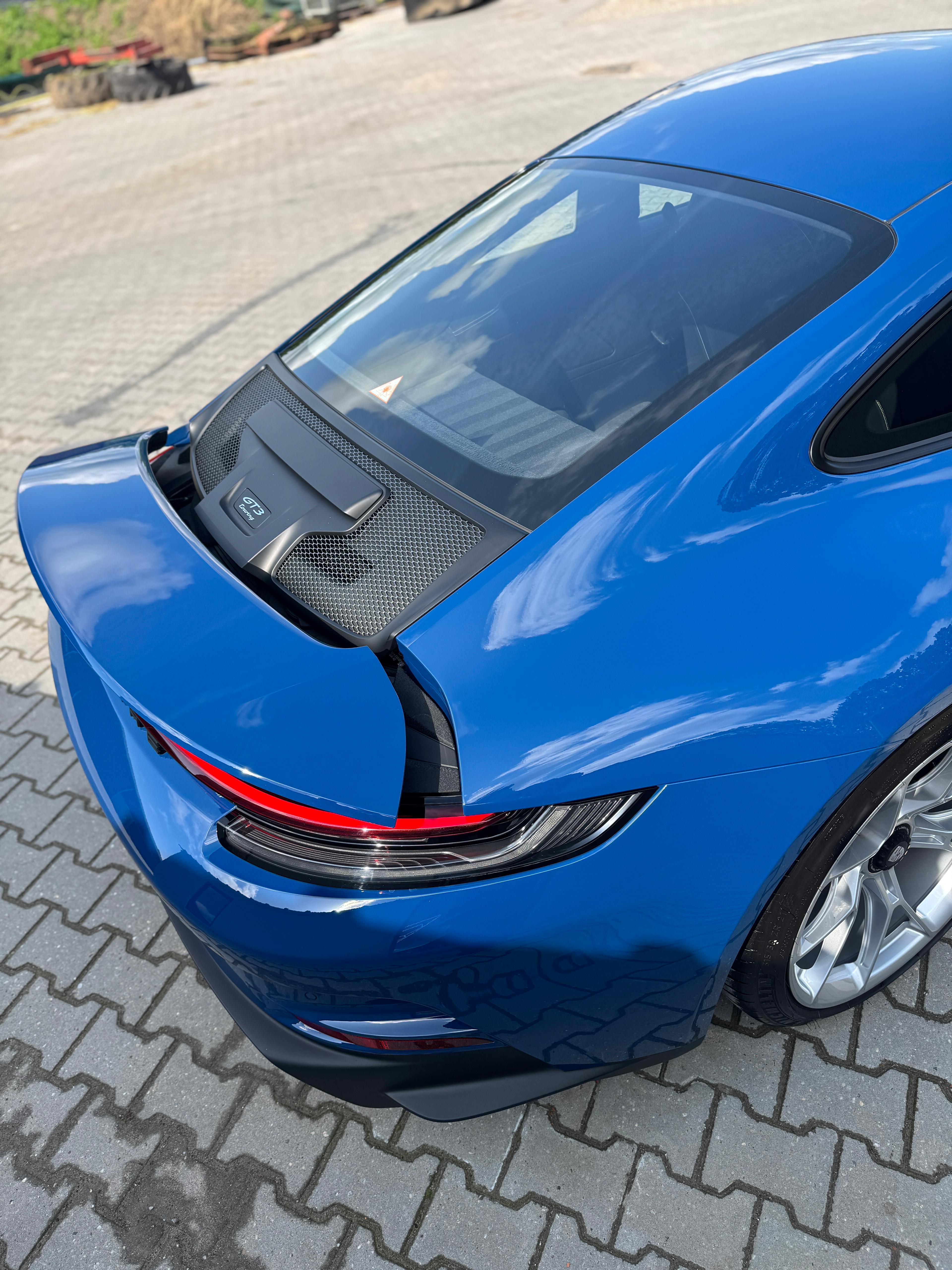 Porsche 911 GT3 Touring rear detail with carbon fiber